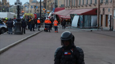 Investigators and members of emergency services work at the site of an explosion in a cafe in Saint Petersburg (Photo: Reuters)