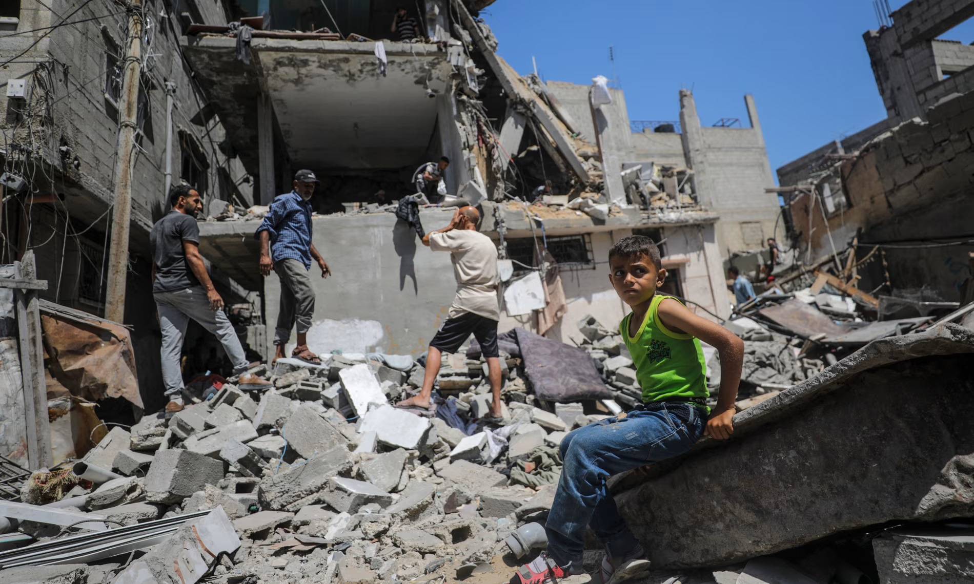 Palestinians search for missing people under the rubble of a destroyed house after an Israeli airstrike in June. Photograph: Mohammed Saber/EPA