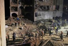 2 Iranian strikes on towns near Israel’s main nuclear research center injure more than 100 people