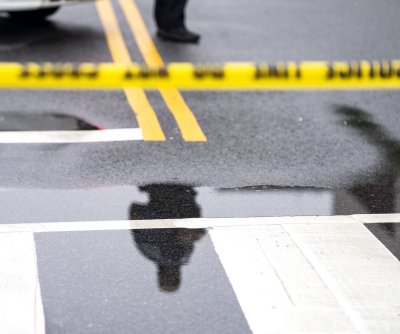 Omaha police: Woman killed by officer amid Walmart abduction attempt