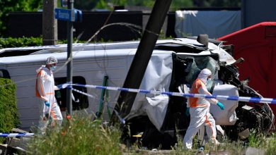 Four people killed after minibus collides with train in Belgium