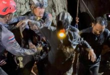 4 miners walk out of Laos mine after water recedes; 2 still missing