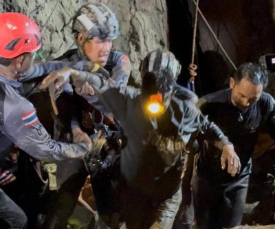 4 miners walk out of Laos mine after water recedes; 2 still missing