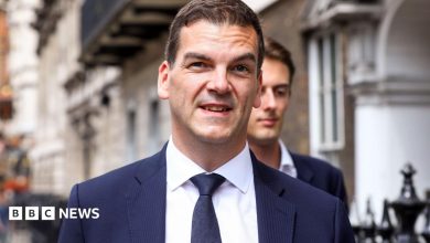 Former top official Robbins takes legal action over sacking