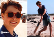 Prince George poses in suit for new photo as he becomes a teenager