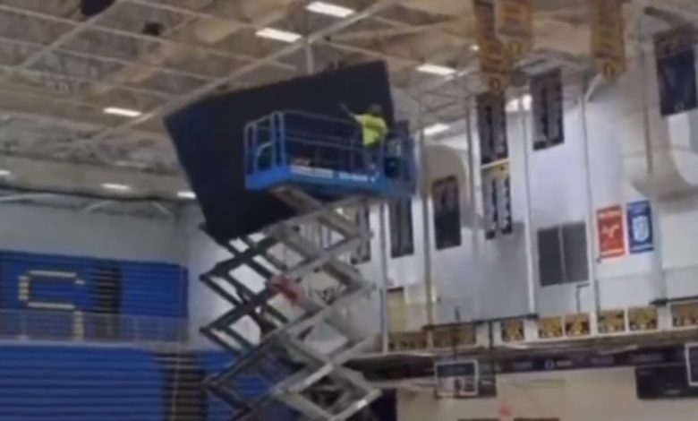 Extraordinary video shows failed jumbotron installation — shatters into pieces as it slams on gym floor