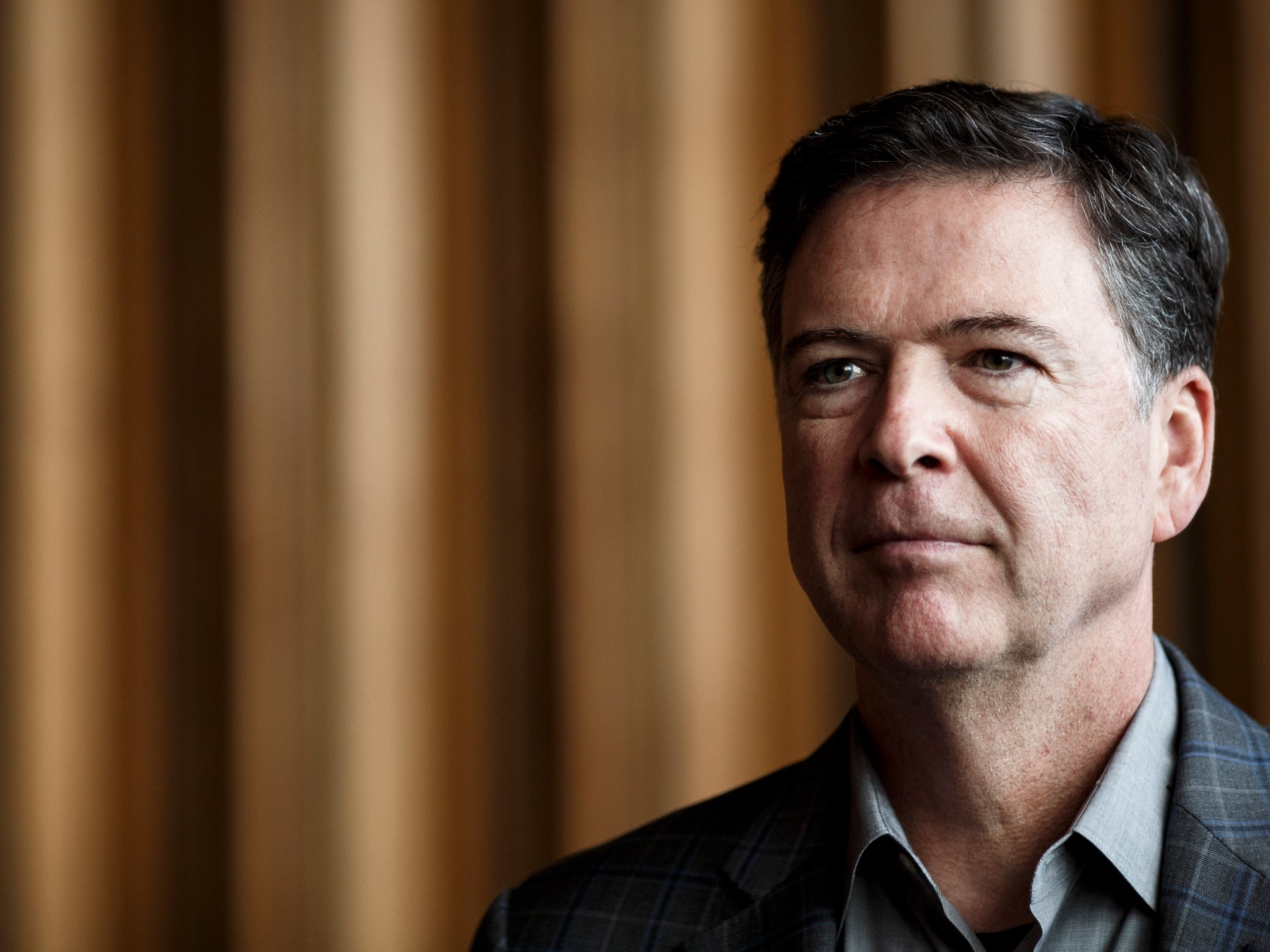 US Department of Justice defends prosecution of Comey over seashell post