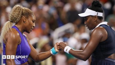 Williams sisters lose on doubles return