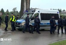 Poland says fire at Starlink station is sabotage as Denmark warns of rising Russian threat