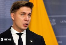 Lithuania ready to ‘fight back’ but has evacuation plans in face of Russia threats, PM tells BBC