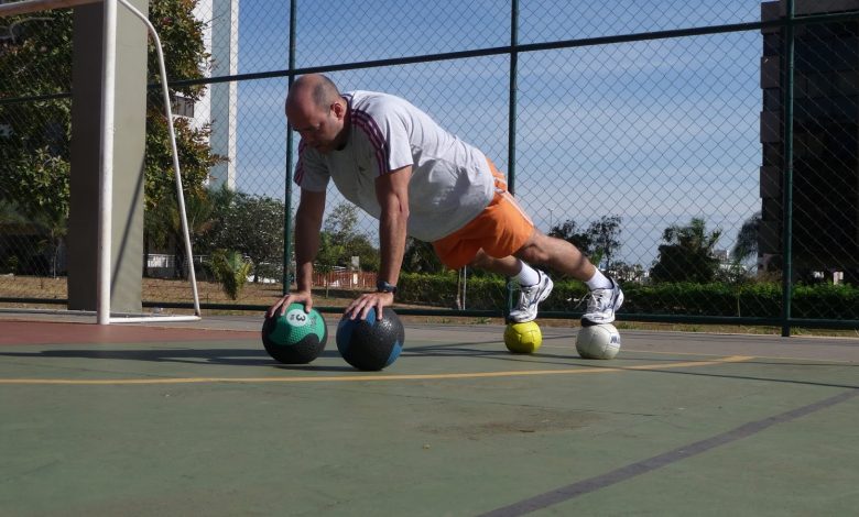 Plank on four medicine balls.jpg