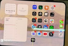An image of an iPhone Duo with a faulty screen lines across the right side of the folding screen.