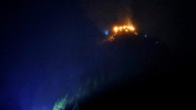 Image caption, The Eagle's Nest was still on fire early on Saturday