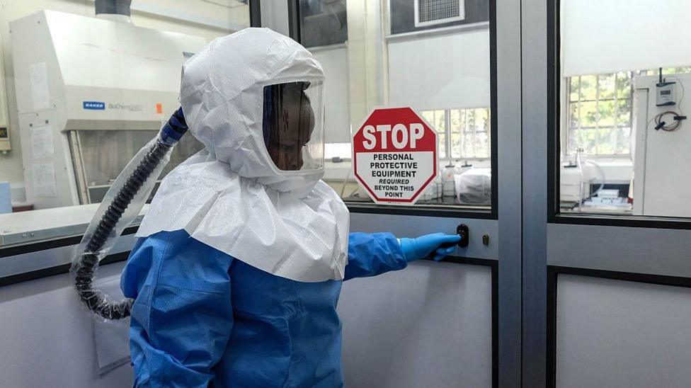 Image caption, Health officials are investigating if both patients contracted the virus at the aiport