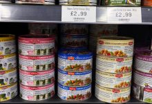 Meze style dishes in tins on a supermarket shelf