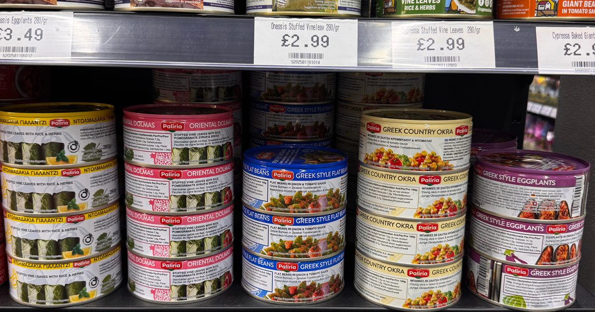 Meze style dishes in tins on a supermarket shelf