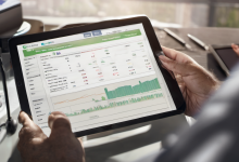 AI-generated image: A person is holding a tablet displaying a financial chart with green lines and graphs.