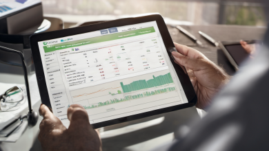 AI-generated image: A person is holding a tablet displaying a financial chart with green lines and graphs.
