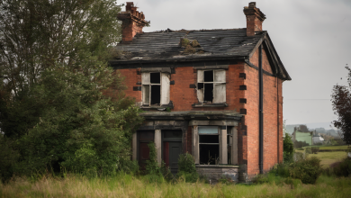 AI-generated image: A dilapidated, two-story brick house with a slate roof.