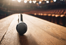 AI-generated image: A black microphone is positioned on a wooden surface.