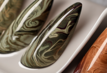 AI-generated image: Several nail designs are arranged in shallow white ceramic trays.
