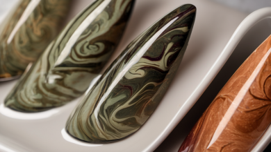 AI-generated image: Several nail designs are arranged in shallow white ceramic trays.