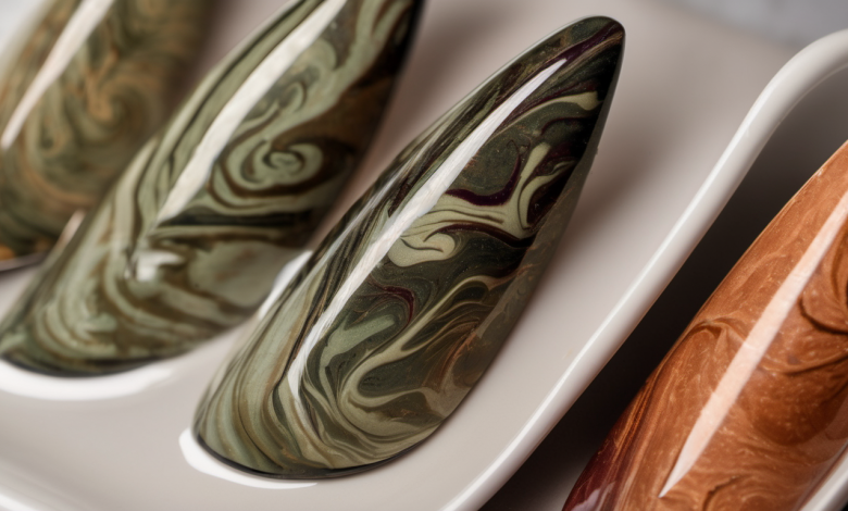 AI-generated image: Several nail designs are arranged in shallow white ceramic trays.