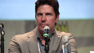 Michael Trucco working out at home in a garage with fitness equipment