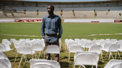 AI-generated image: A middle-aged Black man is standing in the foreground.