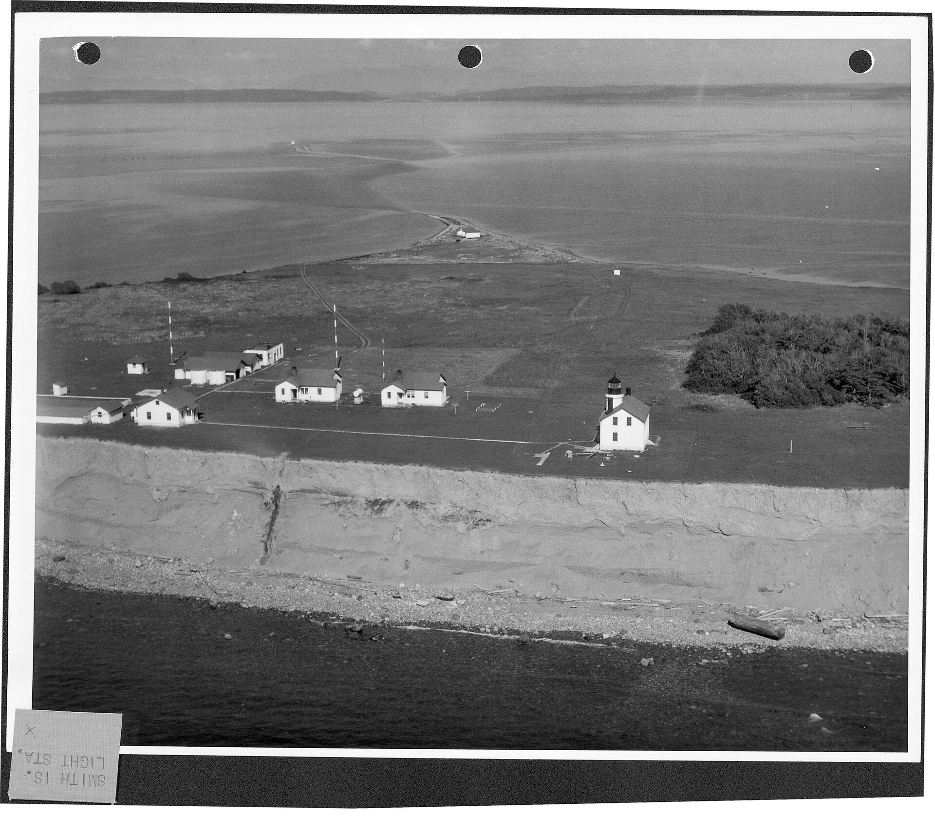 Smith Island Lighthouse and other buildings looking east, 1948. - NARA - 298210.tif