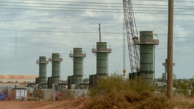 Gas turbines made by GE Vernova, at the on-site natural gas plant under construction during a media tour of the Stargate AI data center…