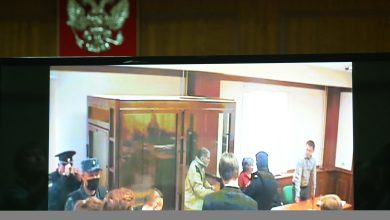 A screen set up at a hall of the Moscow City Court broadcasts the verdict in the trial of U.S. citizen Stephen Hubbard, accused…