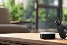 AI-generated image: A wooden table with a black Amazon Fire TV device and a black remote control on it.