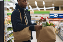 AI-generated image: A young Black man is standing in a supermarket aisle.