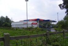 Tesco receipt with fuel coupon showing 8p per litre discount