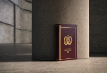 AI-generated image: A burgundy passport lies on a concrete surface.