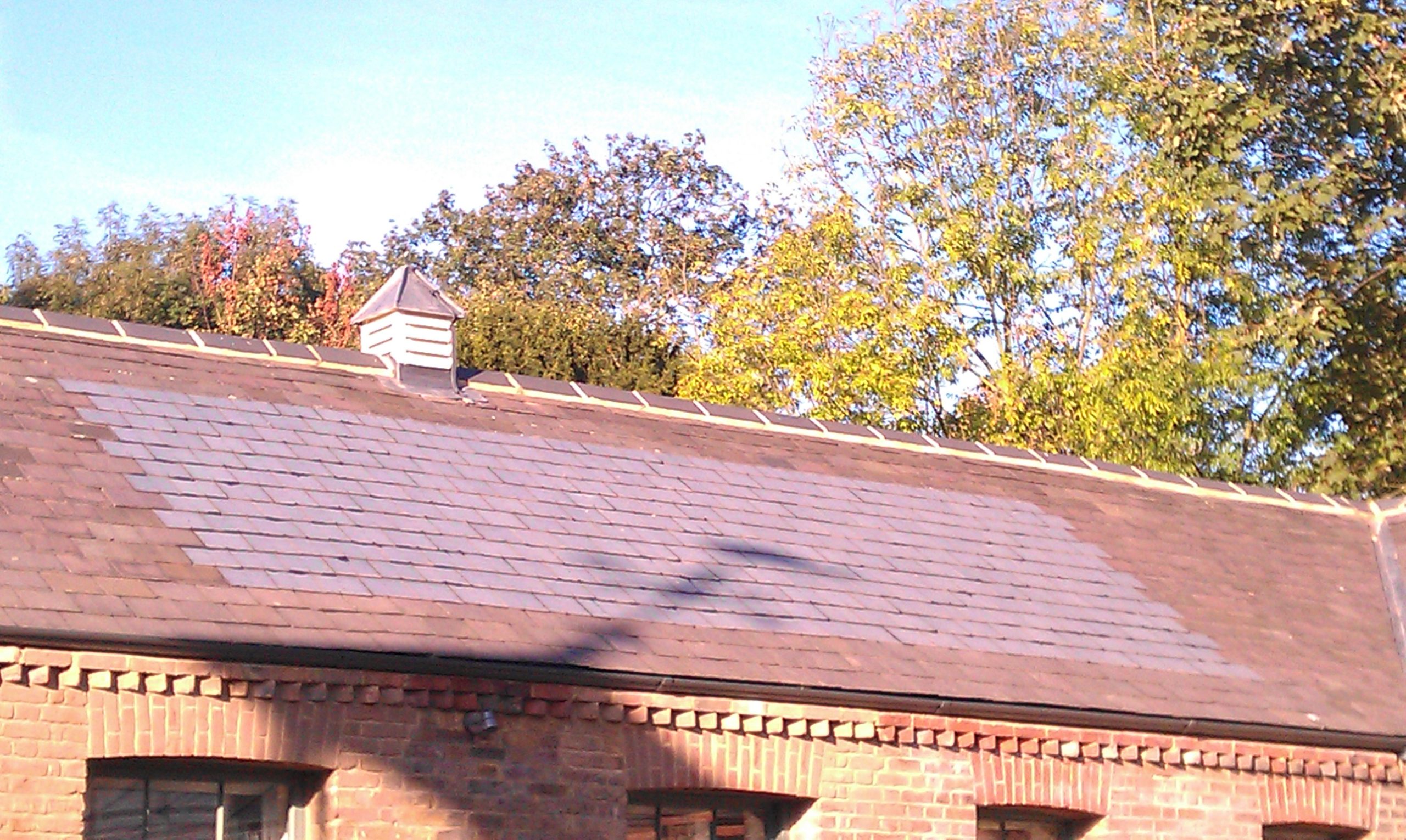 Solar Roof Tiles (36006853223).jpg