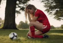 AI-generated image: A young woman is kneeling on a grassy field.